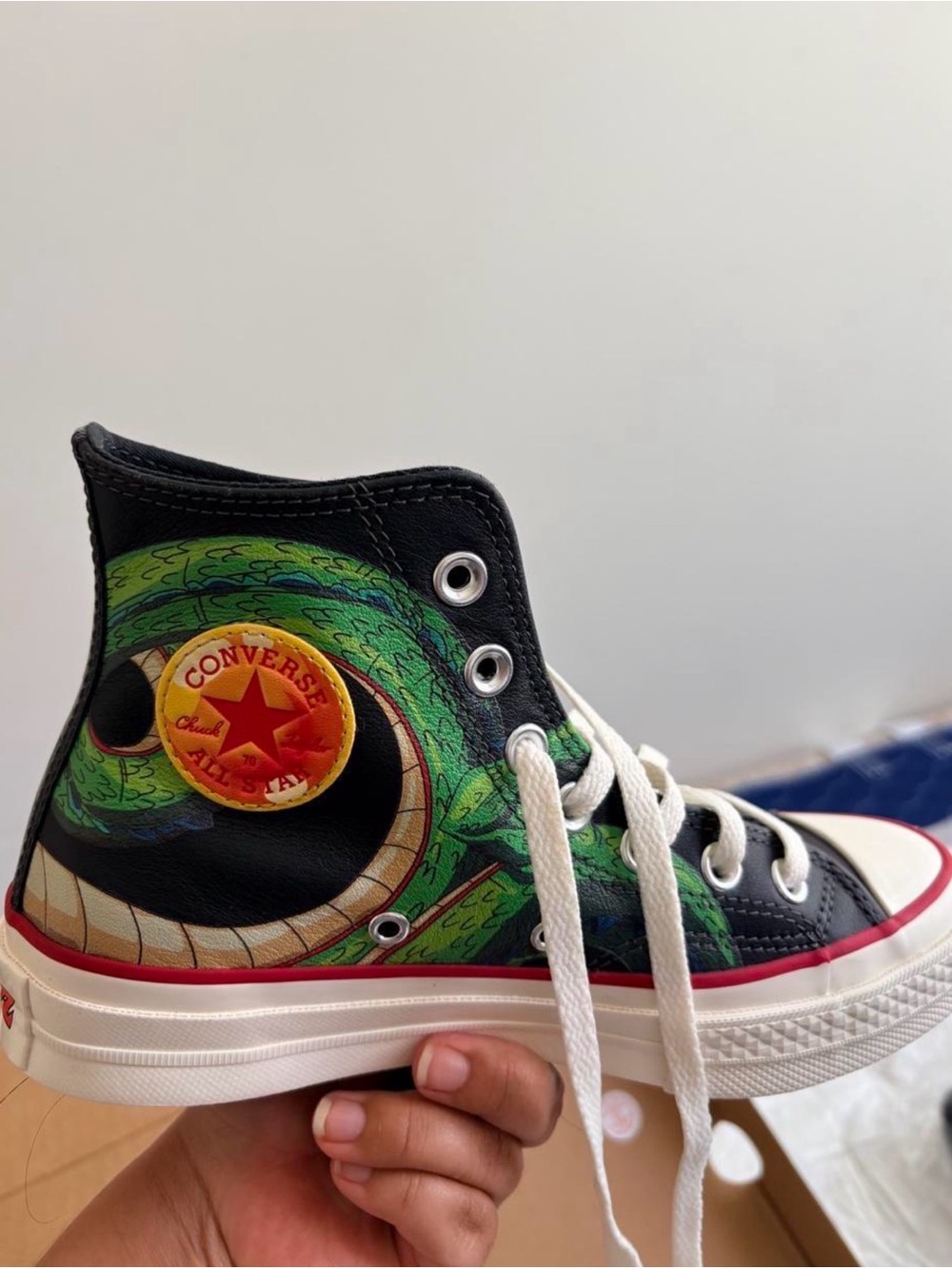 Converse Black High-Top Sneakers with Green Graphic and Red Trim
